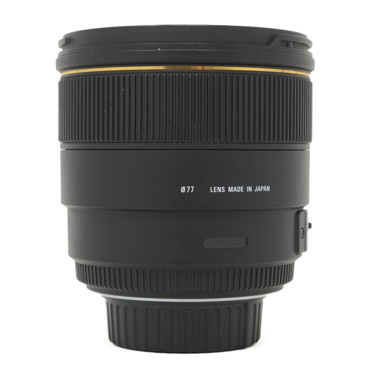 Camera lens made in Japan on a white background