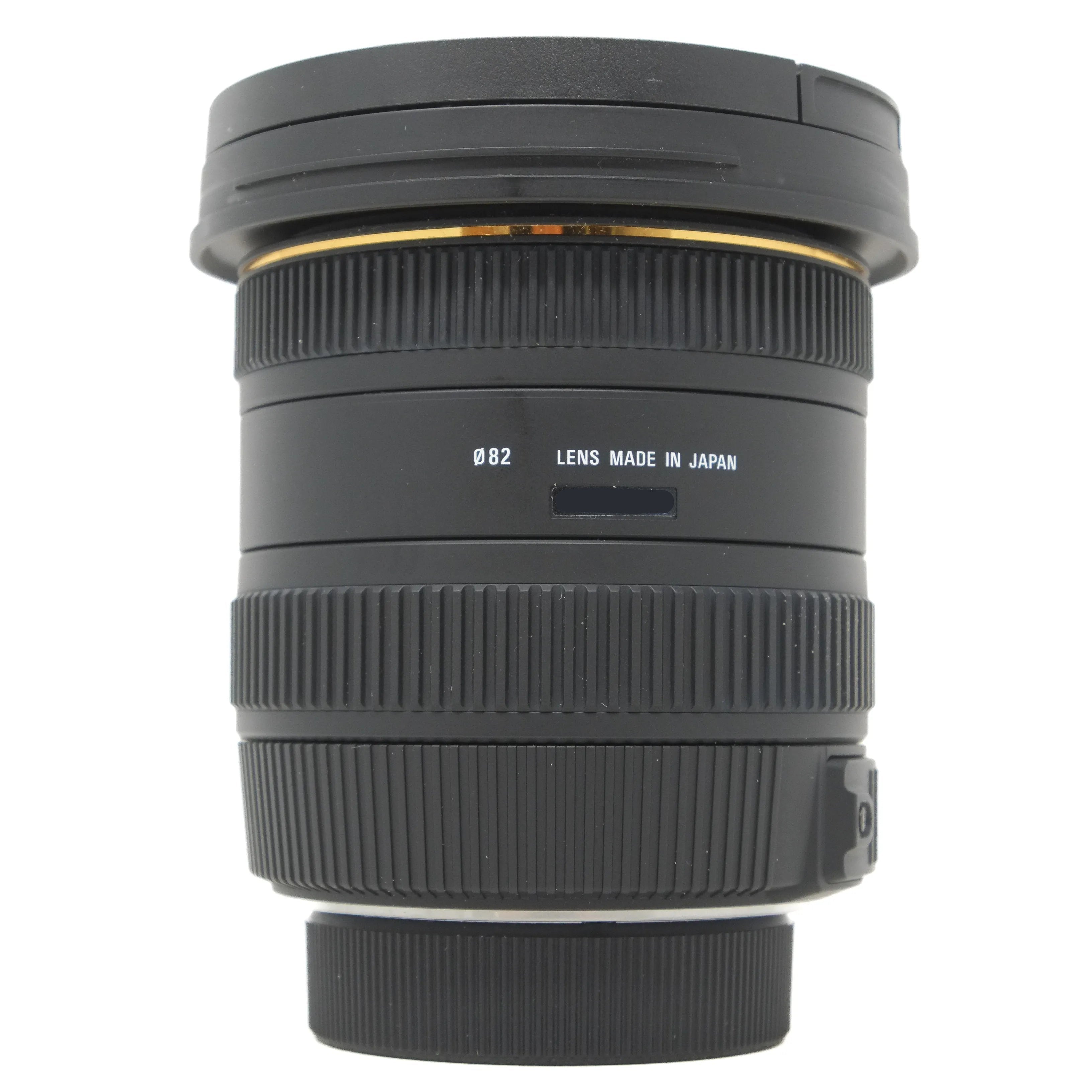 Camera lens made in Japan on a white background