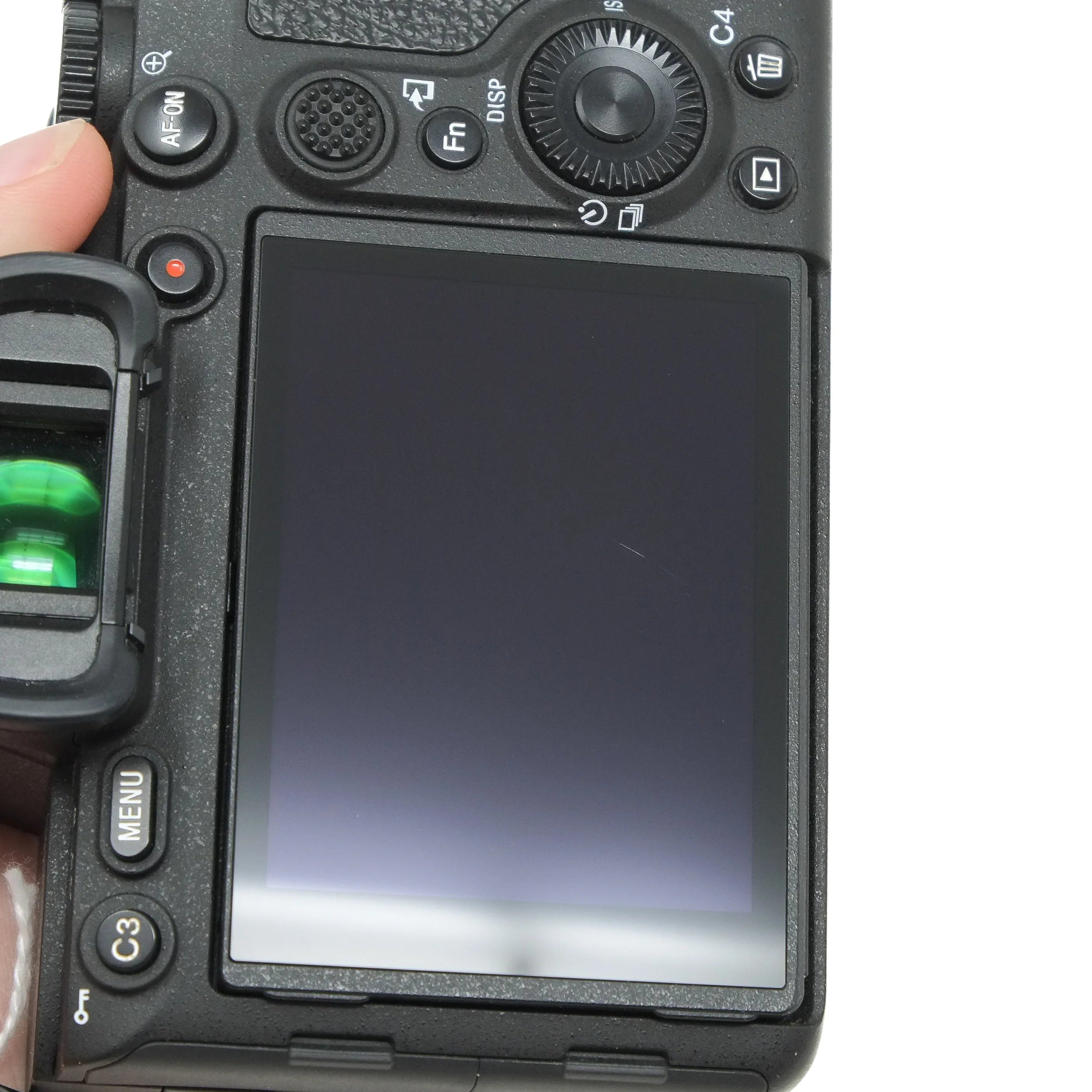 Camera back with screen and control buttons on a white background