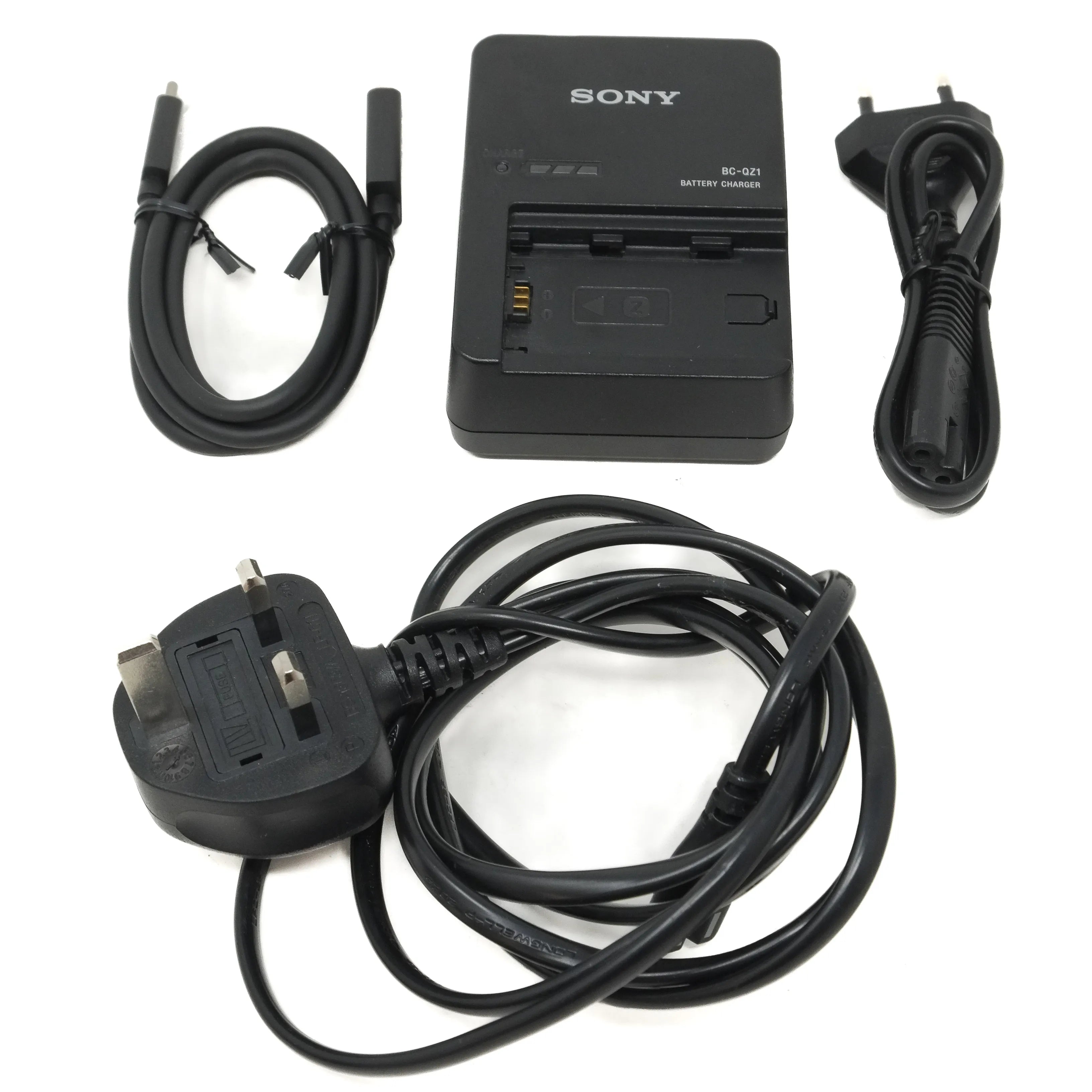 Sony battery charger with cables on a white background