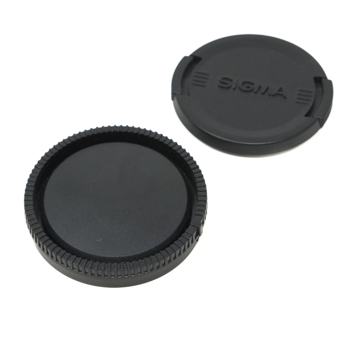 Two black camera lens caps with Sigma branding on a white background