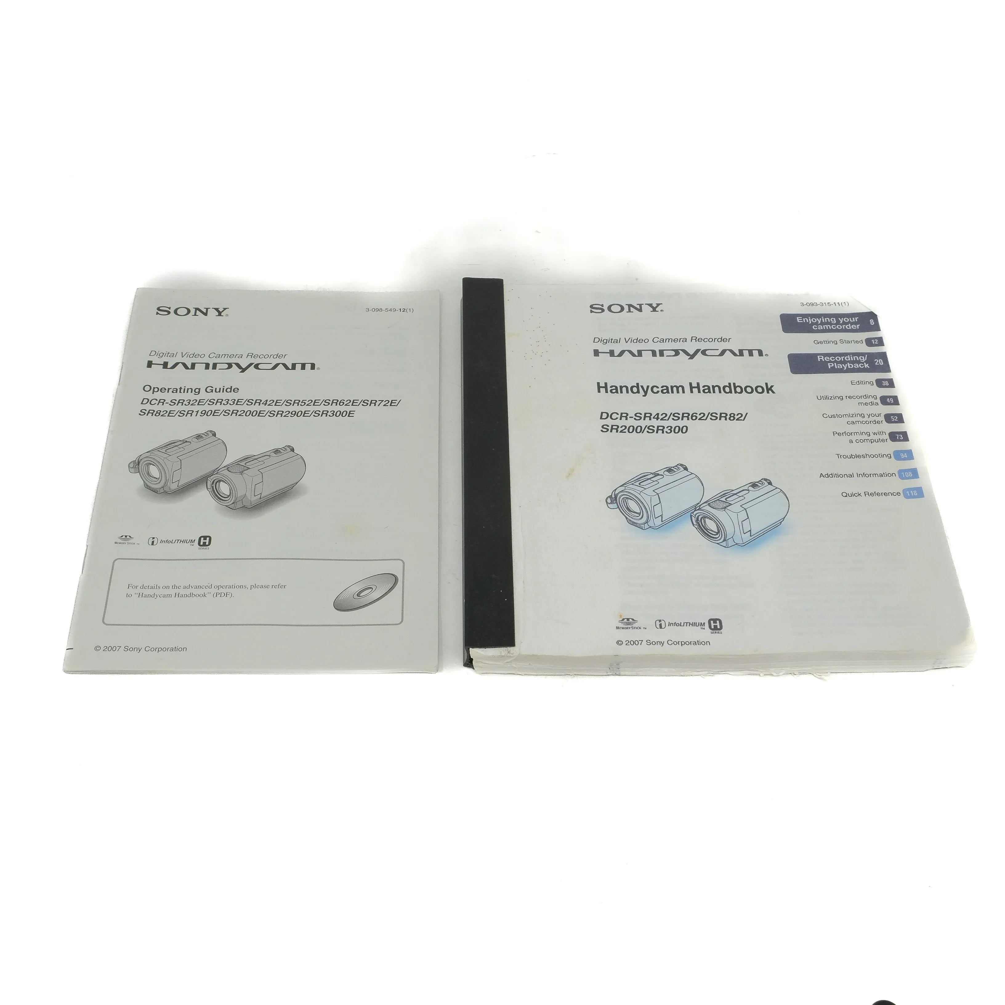 Two Sony Handycam manuals on a white background
