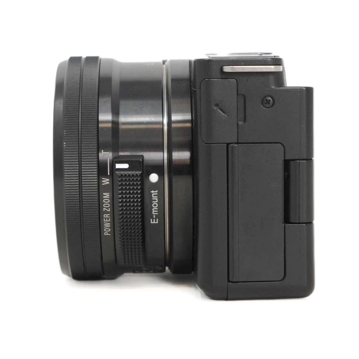 Black camera lens and body on a white background