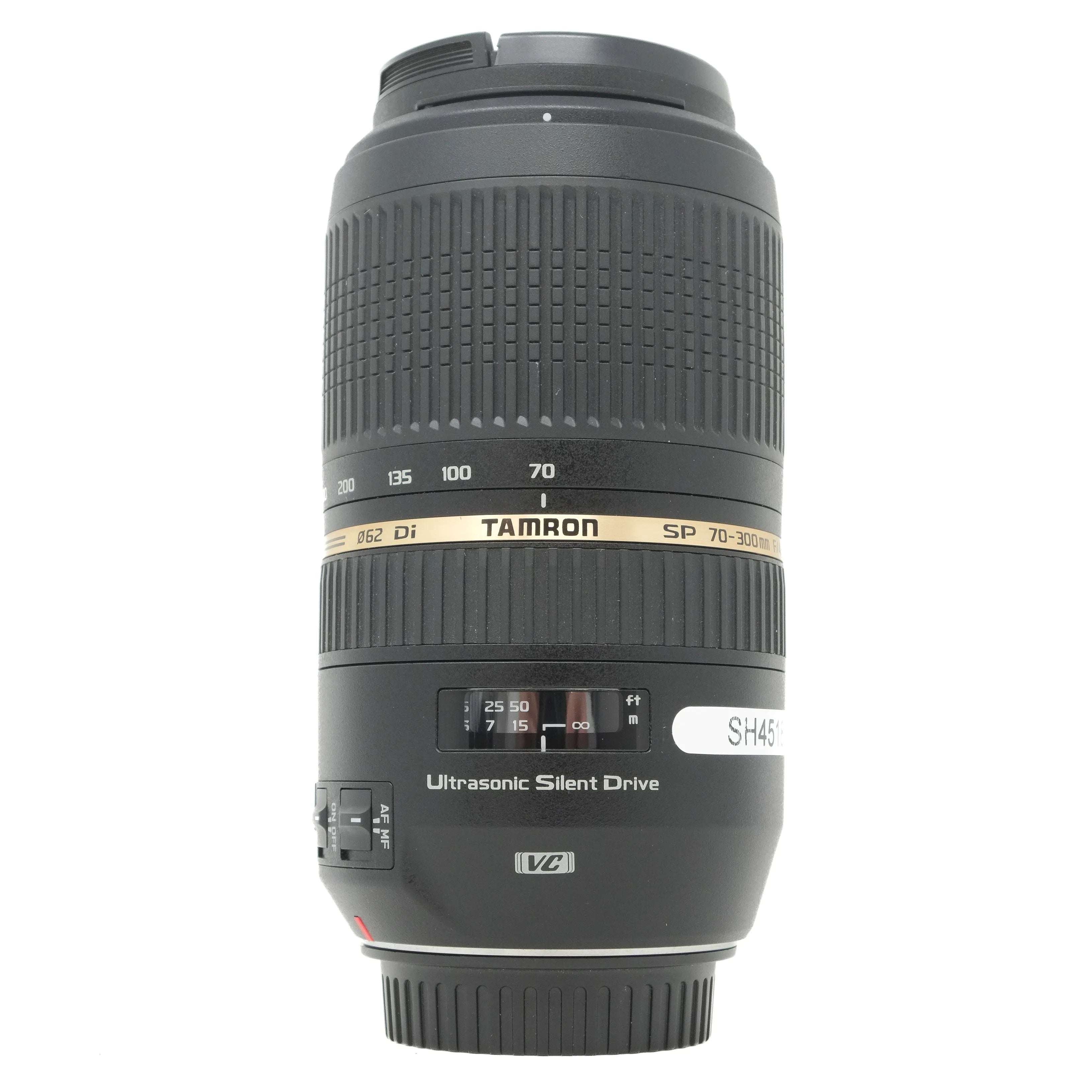 Camera lens with Tamron branding on a white background