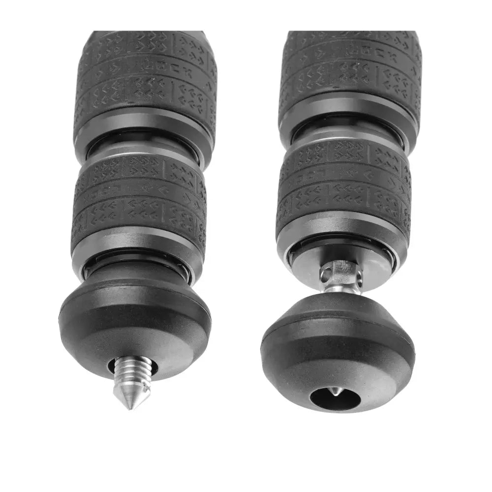 Pair of black dumbbells with textured grips on a white background