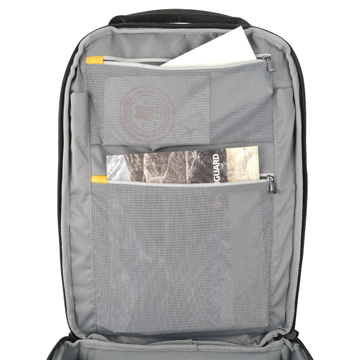 Gray backpack with a front pocket containing a magazine on a white background