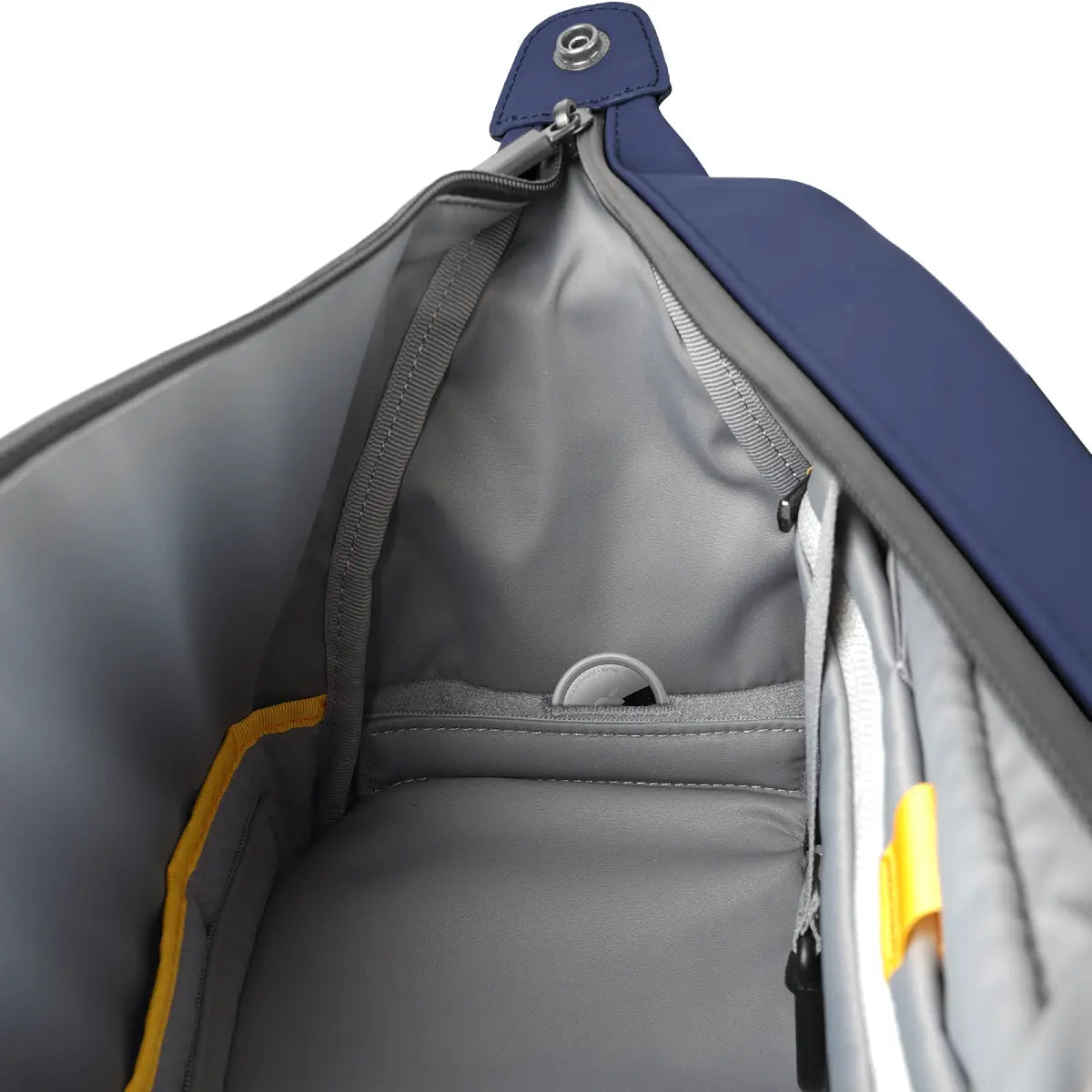 Gray and blue bag with open compartment showing interior details