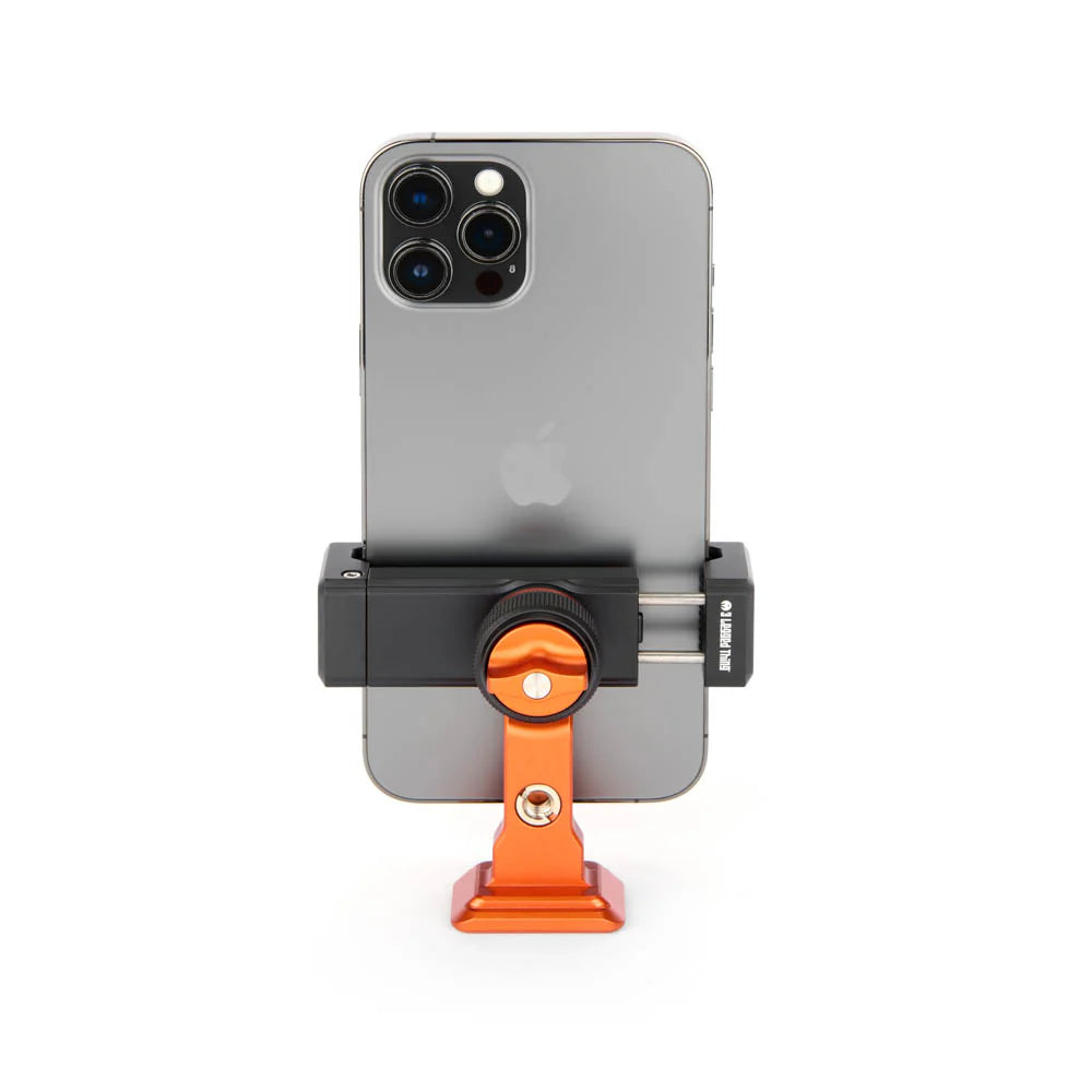 An orange and black phone mount holding a gray smartphone, shown from the back against a clean white background.