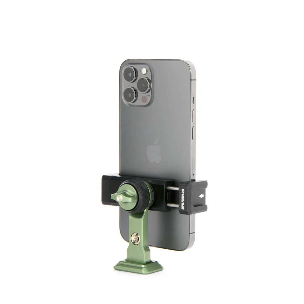 A green and black phone mount with a smartphone inserted, shown on a plain white background.
