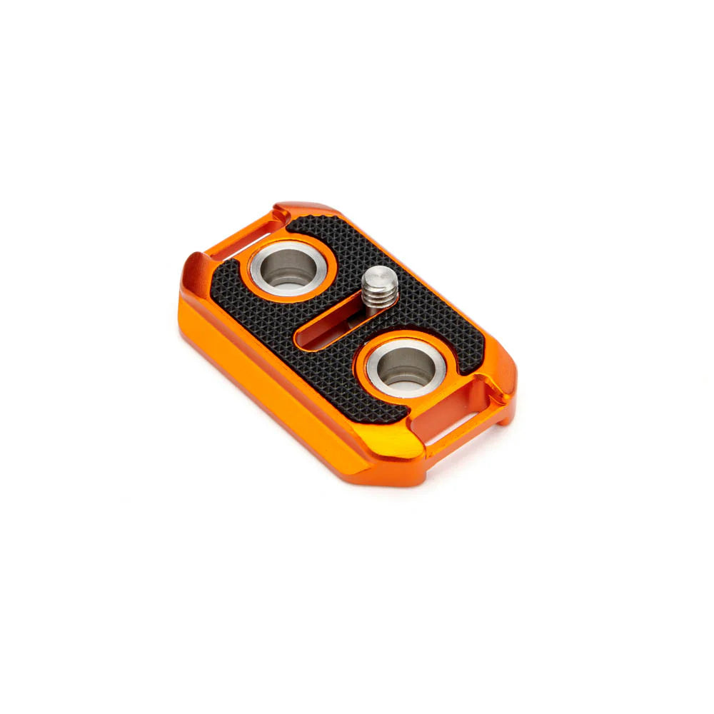 Orange and black Tripod Plate camera accessory on a white background