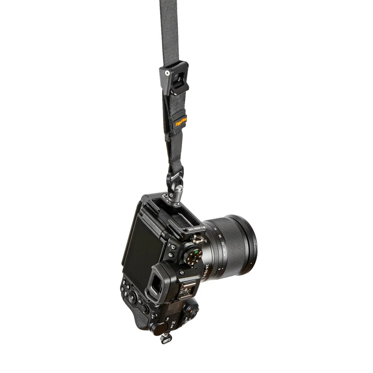 Camera with a strap on a white background