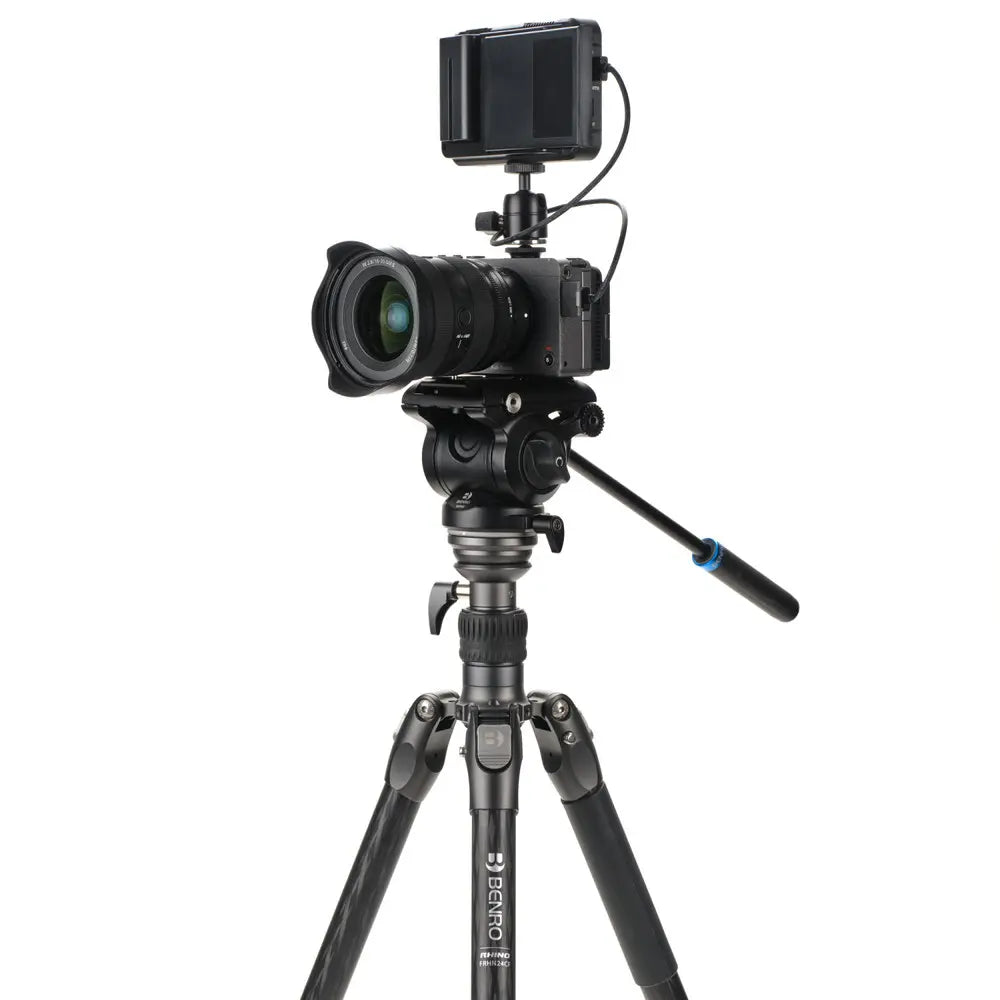 Camera on a tripod with a screen attached on a white background