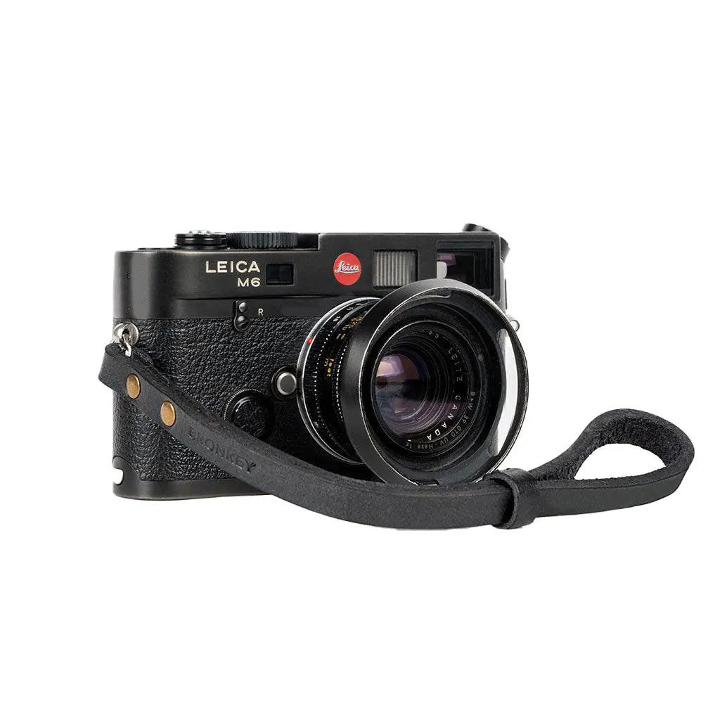 Leica M6 camera on a white background