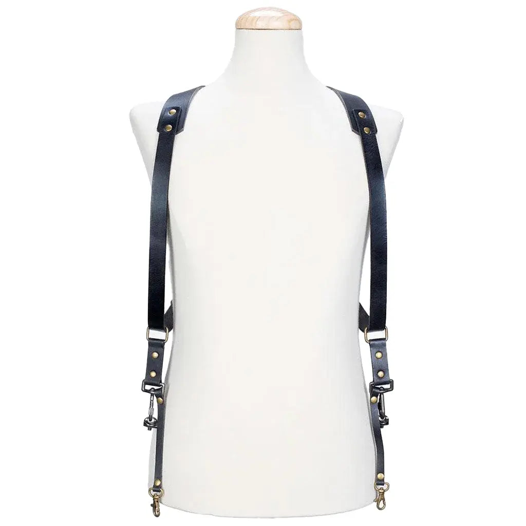 Black leather suspenders on a mannequin against a white background