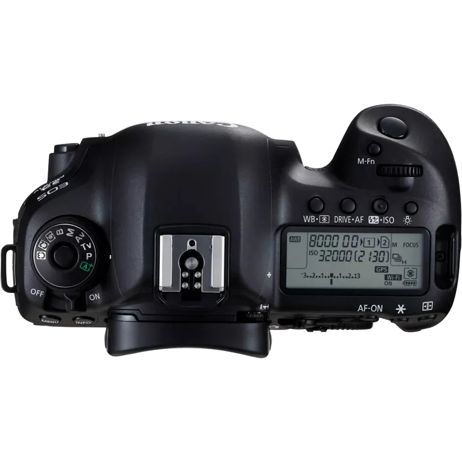 Top view of a black DSLR camera on a white background