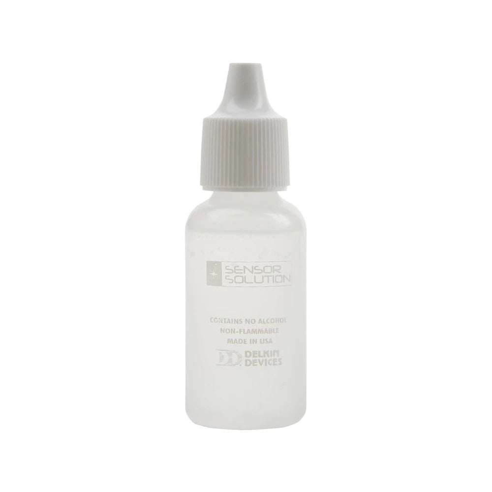 White bottle with a gray cap on a white background
