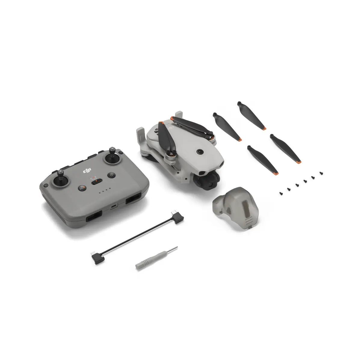 DJI Mavic Mini drone and accessories on a white background