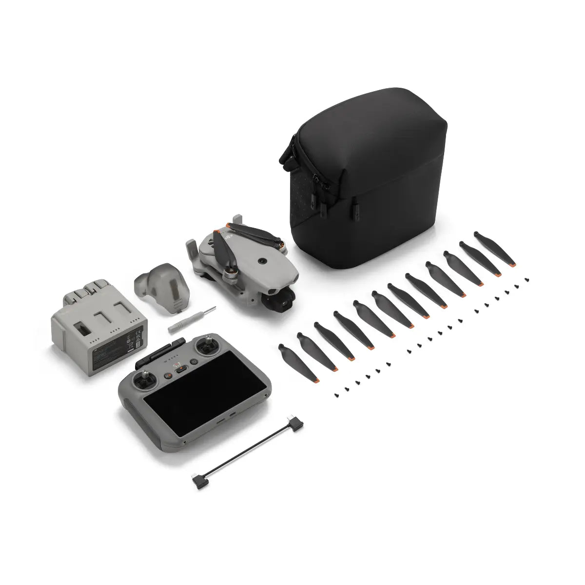DJI Mavic Mini drone and accessories on a white background