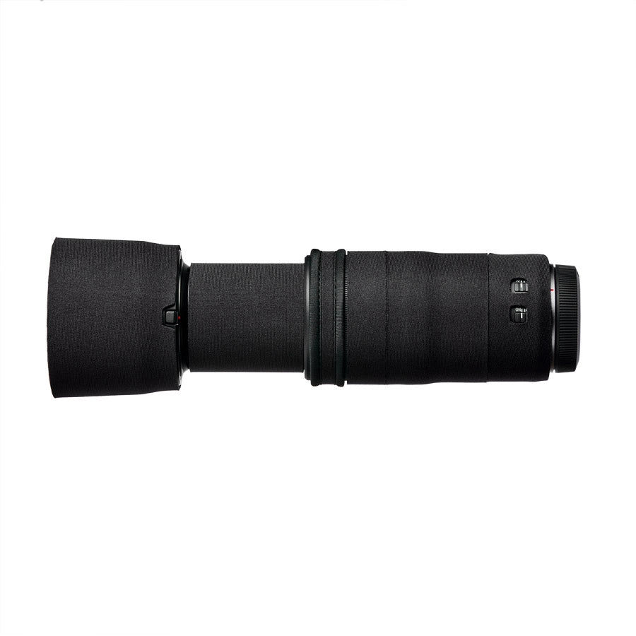 Black camera lens on a white background