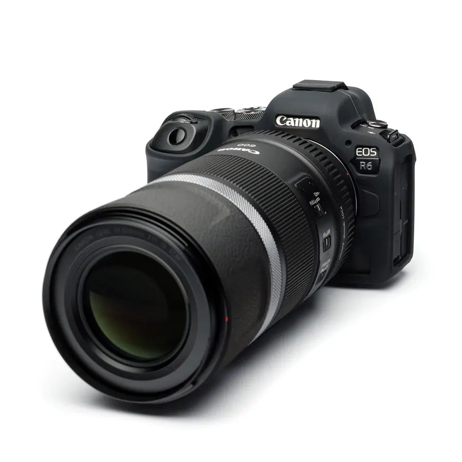 Canon EOS R6 camera with a large lens on a white background