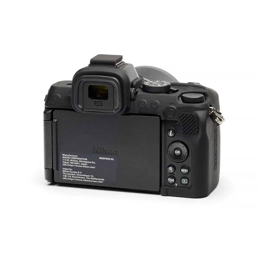 Black Nikon camera on a white background
