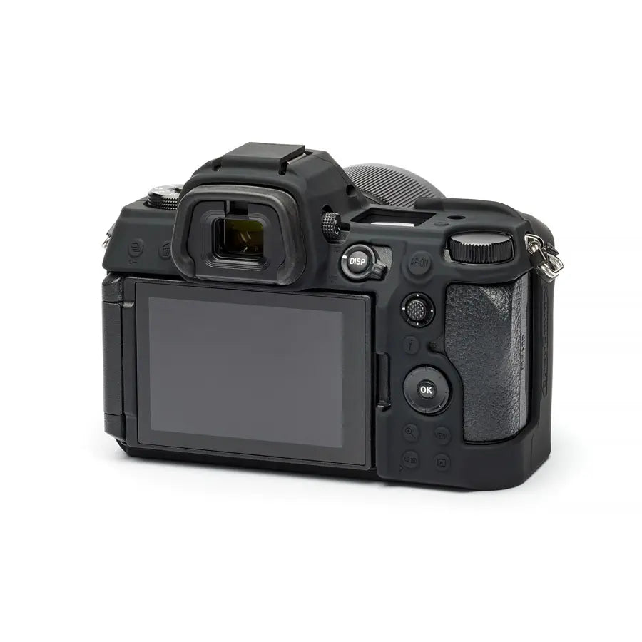 Black camera body on a white background