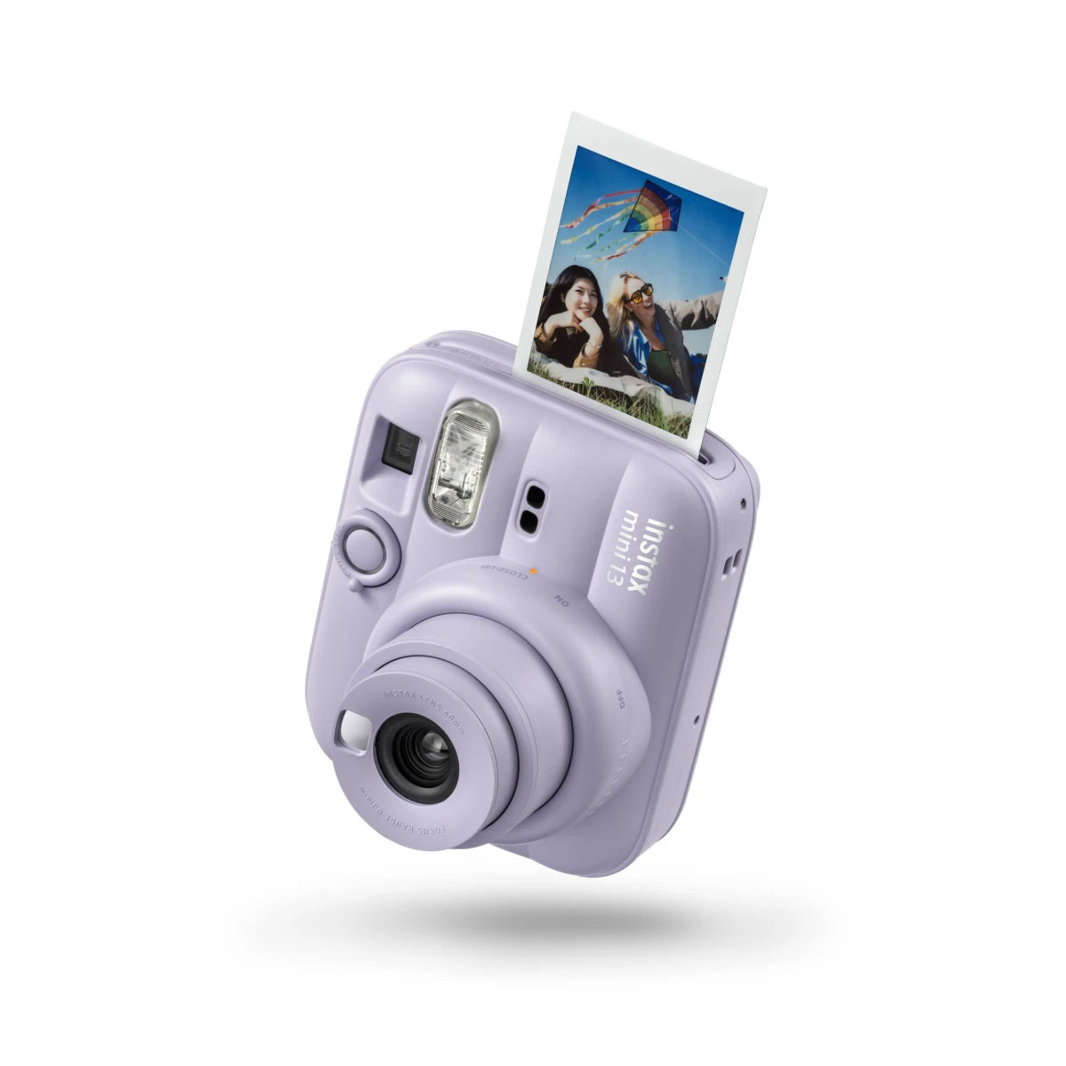 Lavender instant camera with a photo on a white background
