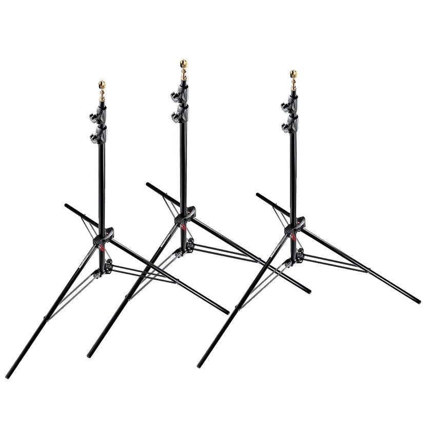 Three Manfrotto 1052BAC air-cushioned aluminium compact stands arranged in a triangular formation with focus on their lightweight and compact design.