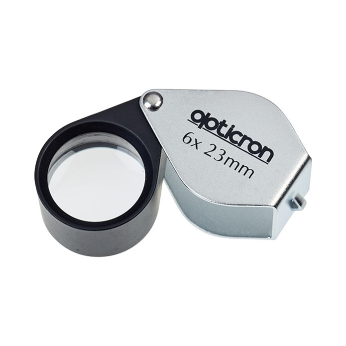 Opticron magnifying glass with 6x magnification and 23mm field of view on a white background