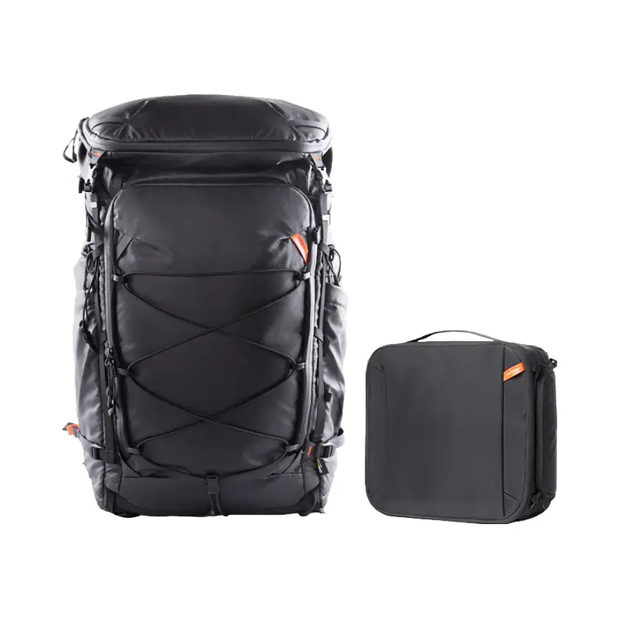 Black travel backpack and suitcase on a white background