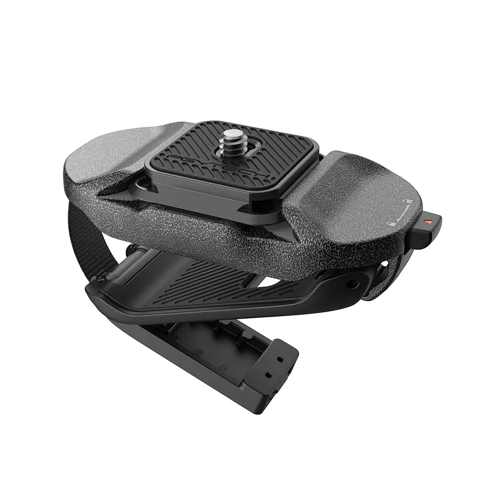 Black foot pedal on a white background