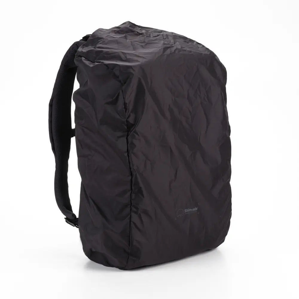 Black backpack on a white background