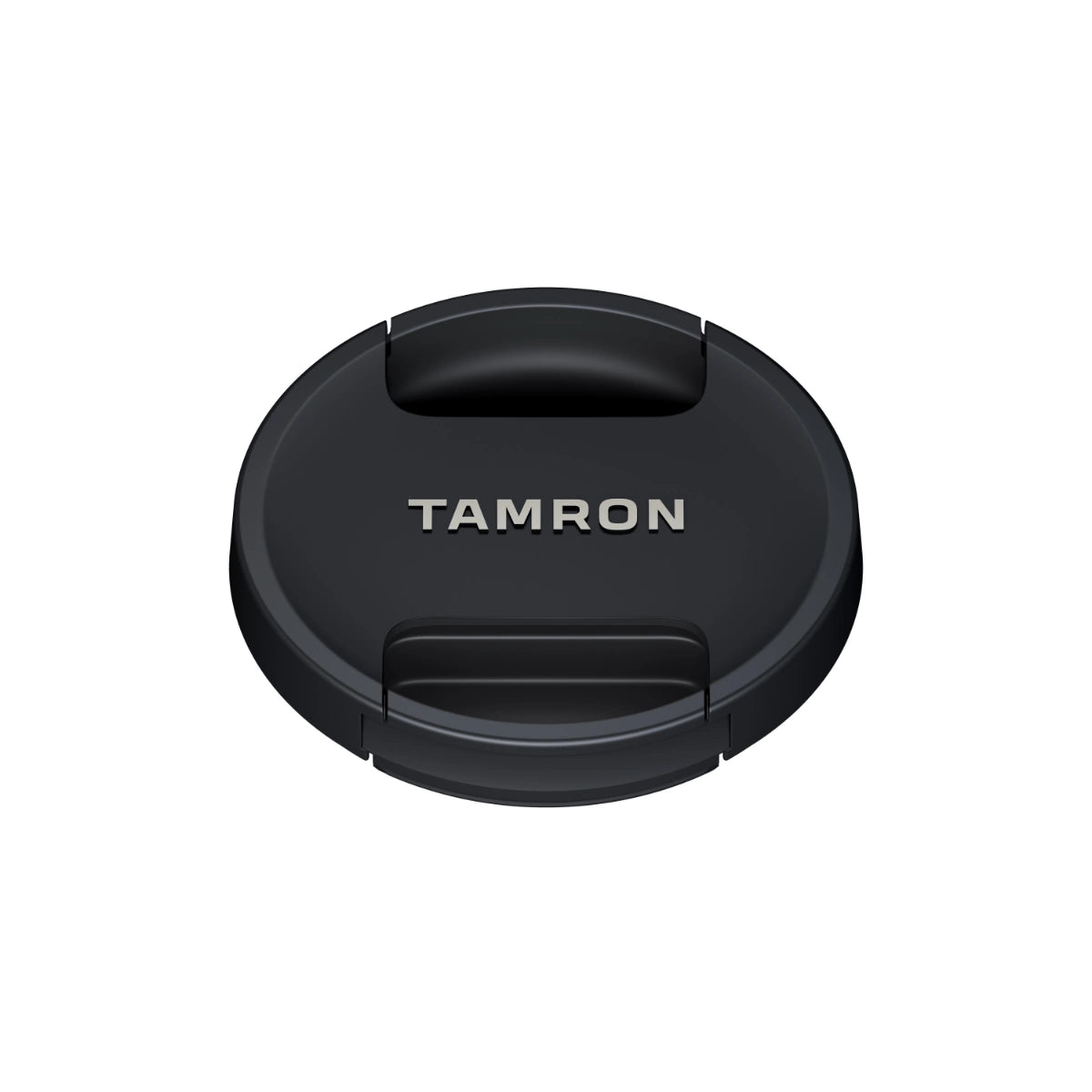 A black Tamron lens cap with silver lettering, shown from a top-down view on a solid white background.