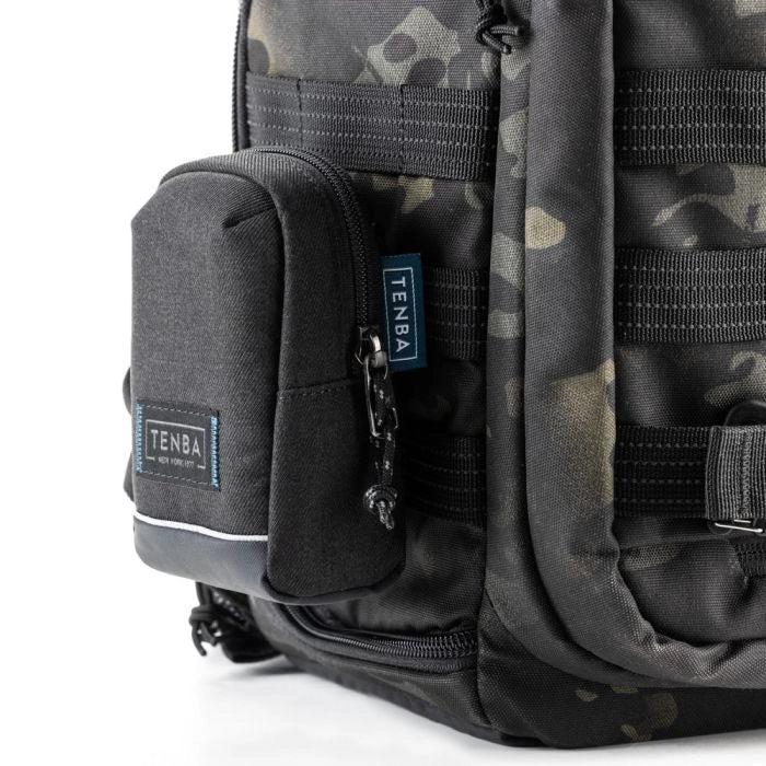 Camouflage backpack with Tenba logo on a white background