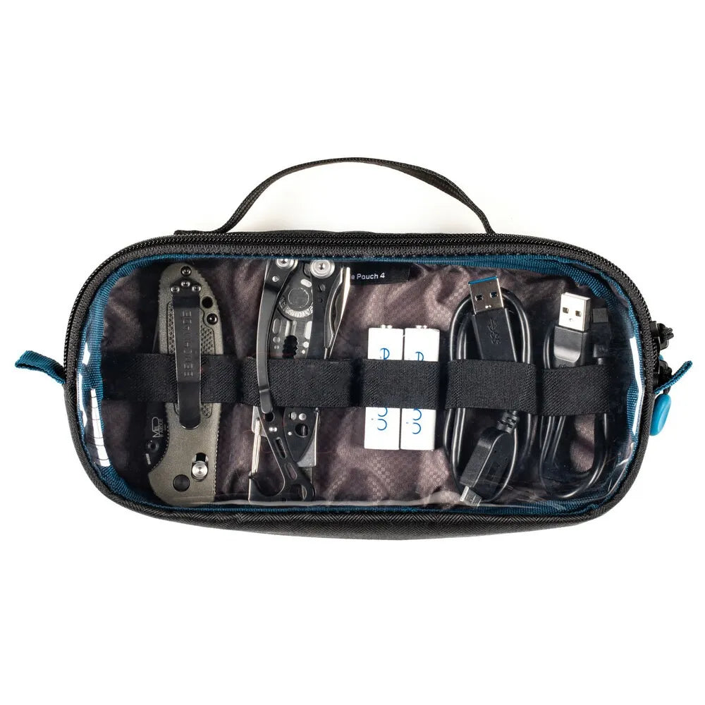 Black travel pouch with various items including a knife, pliers, and cables on a white background