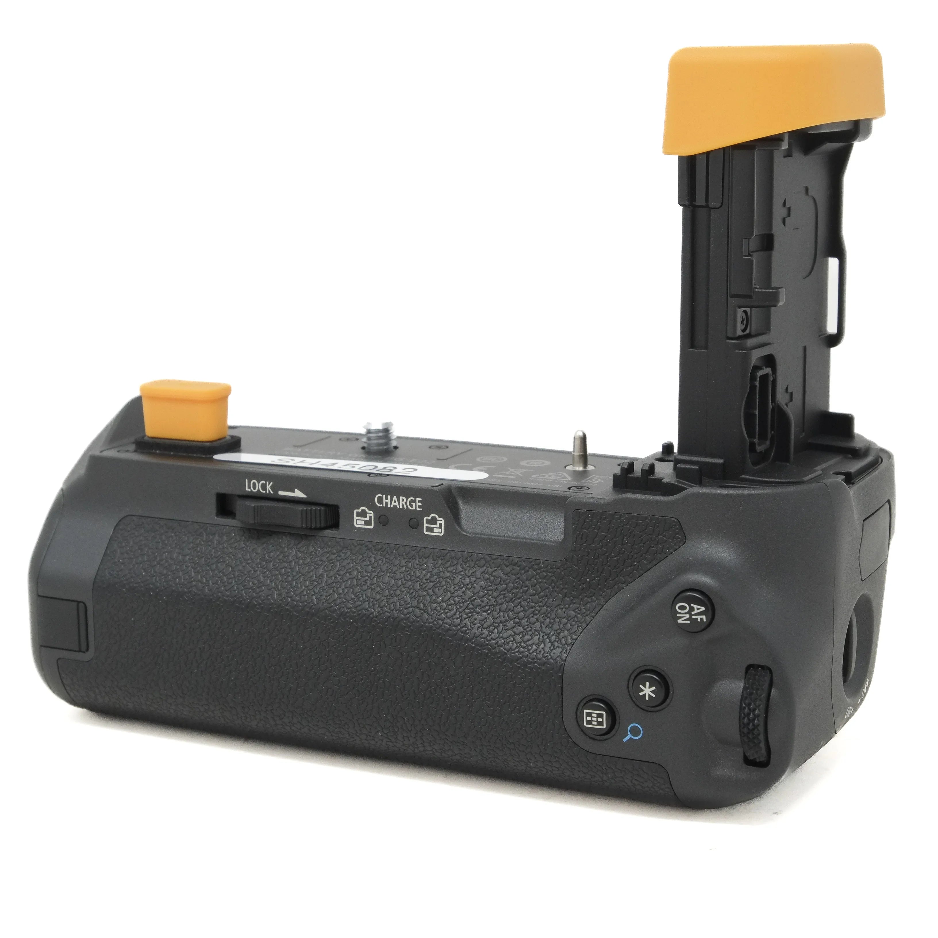 Camera battery grip with orange accents on a white background
