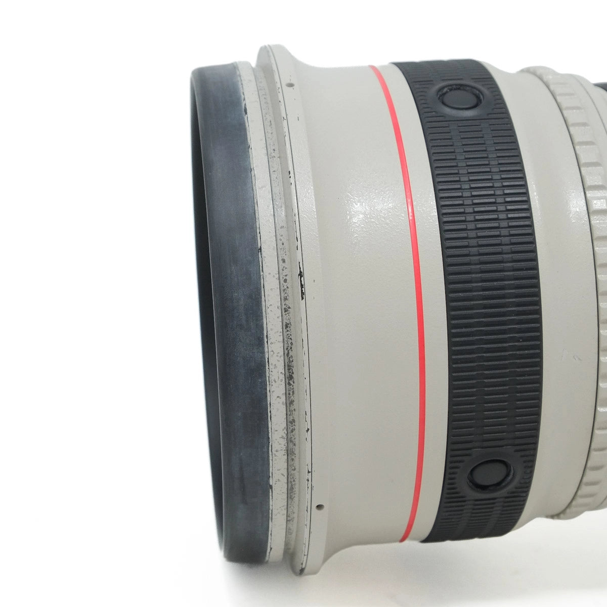 Close-up of a camera lens on a white background