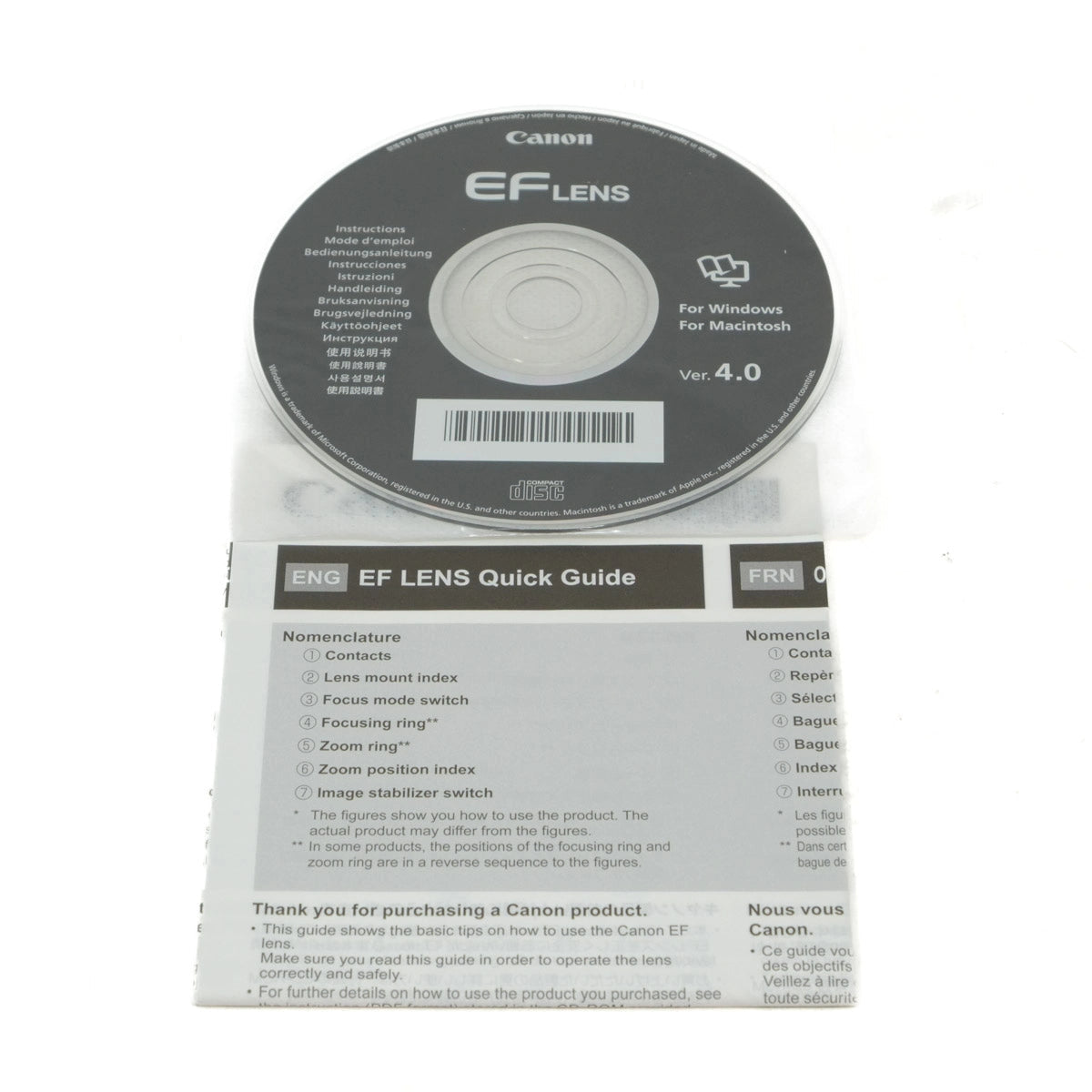 Canon EF Lens CD and quick guide on a white background
