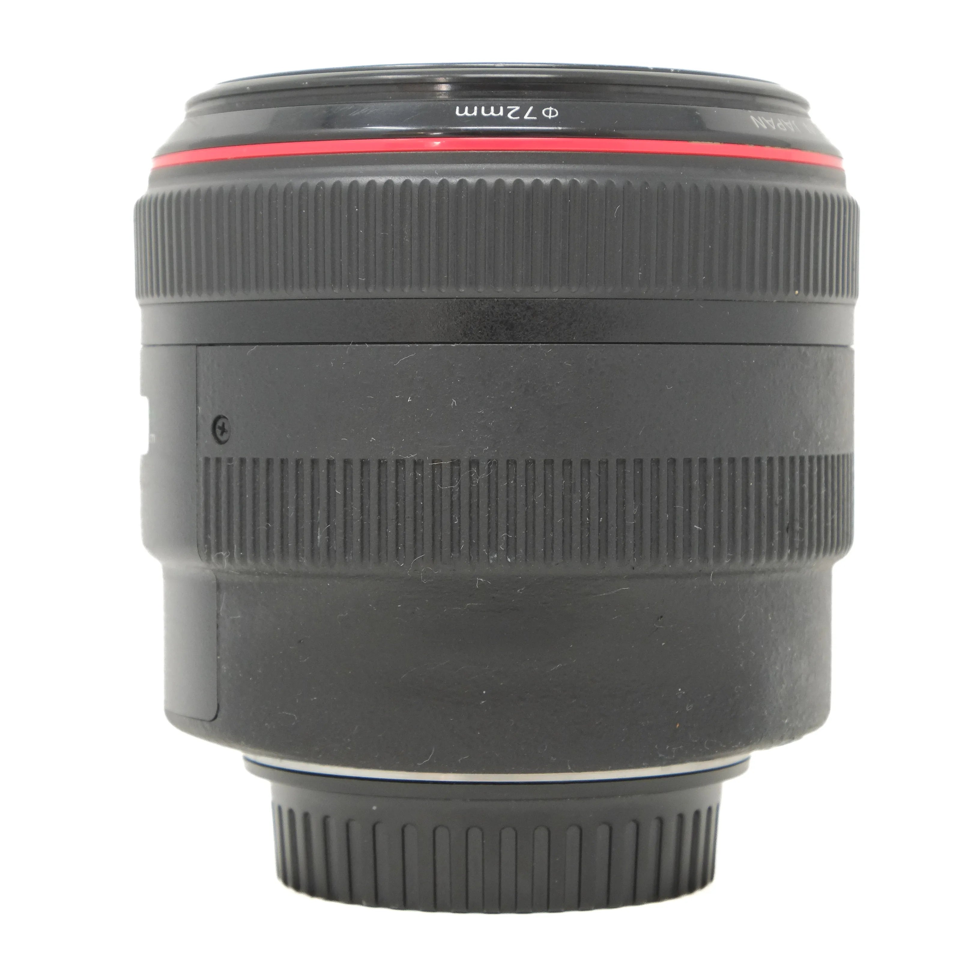 Camera lens with text on a white background