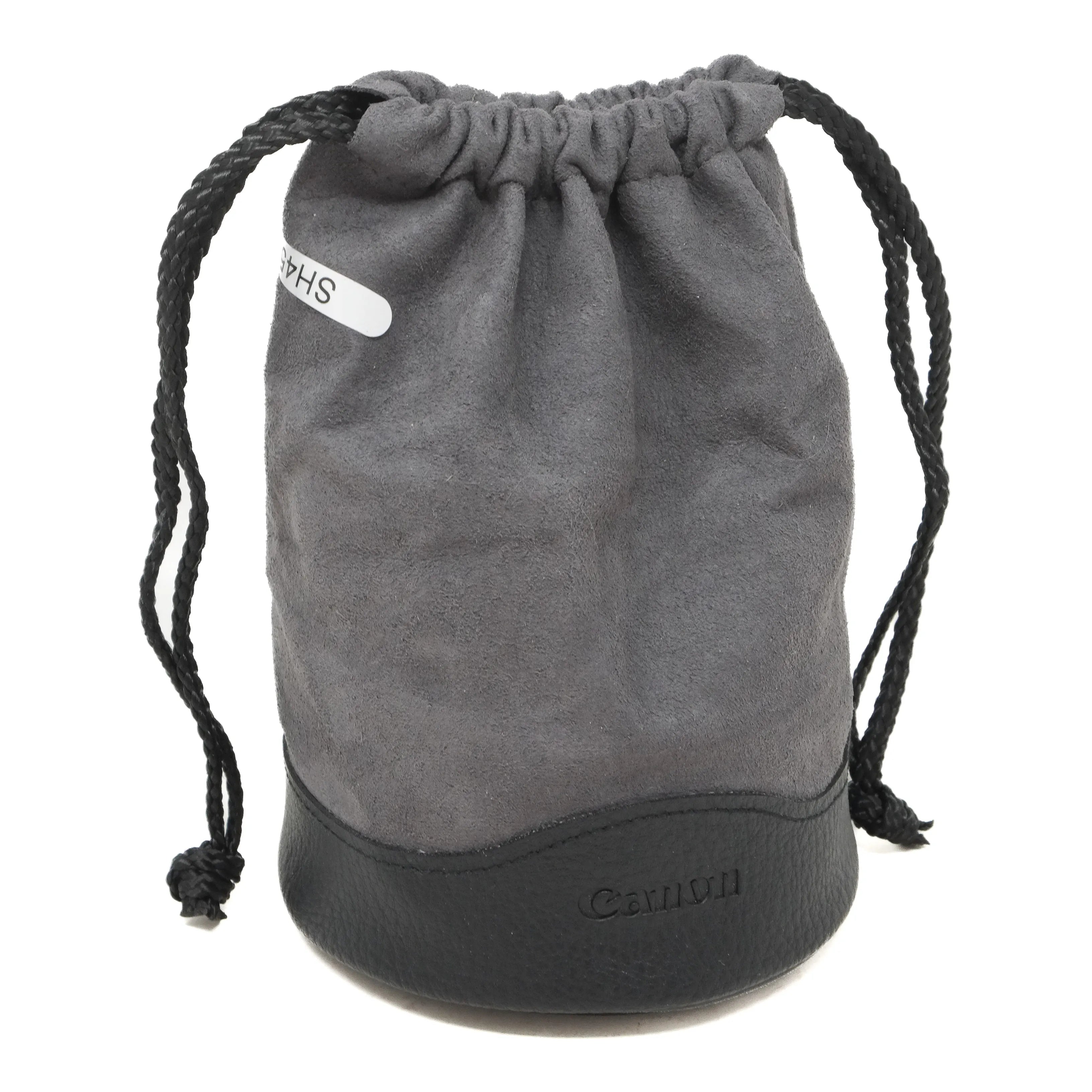 Gray drawstring bag with black drawstrings on a white background