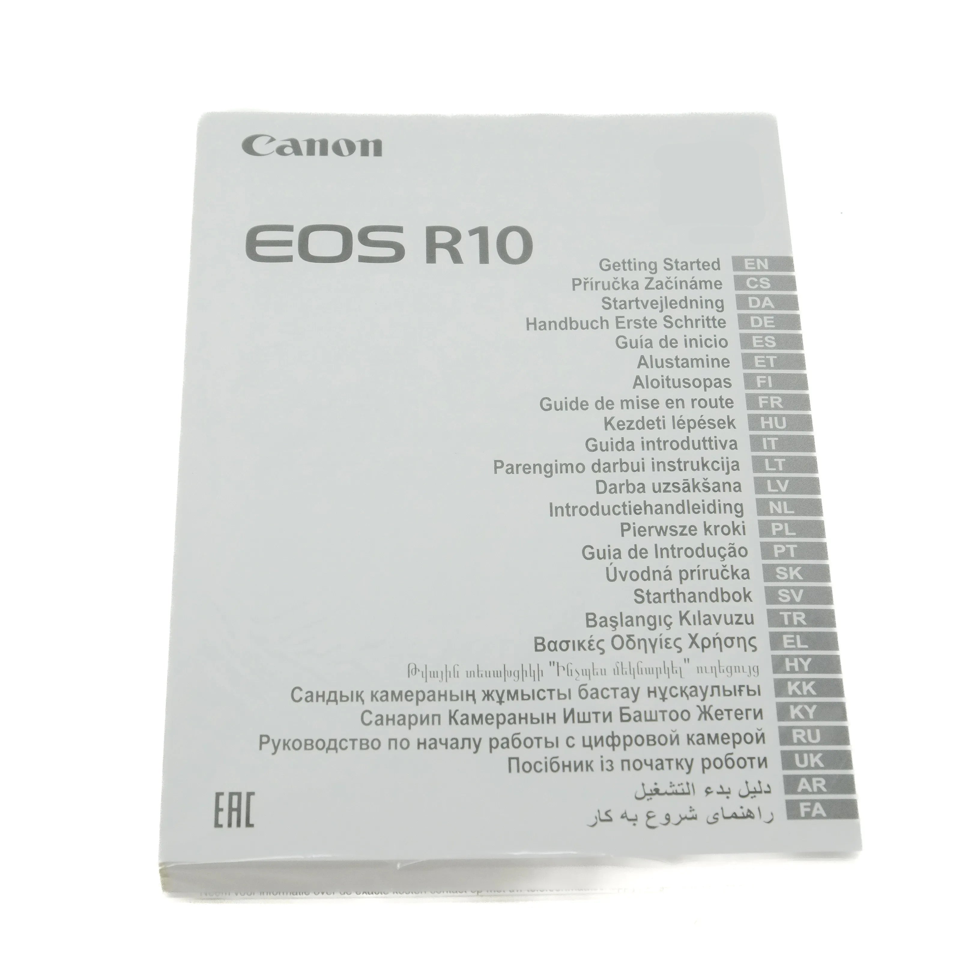 Canon EOS R10 instruction manual on a white background
