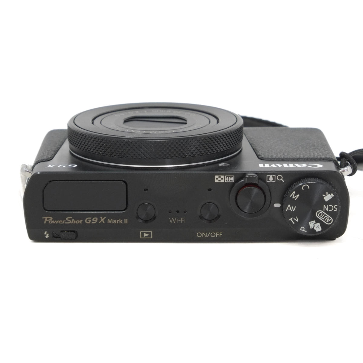 Black Canon camera on a white background
