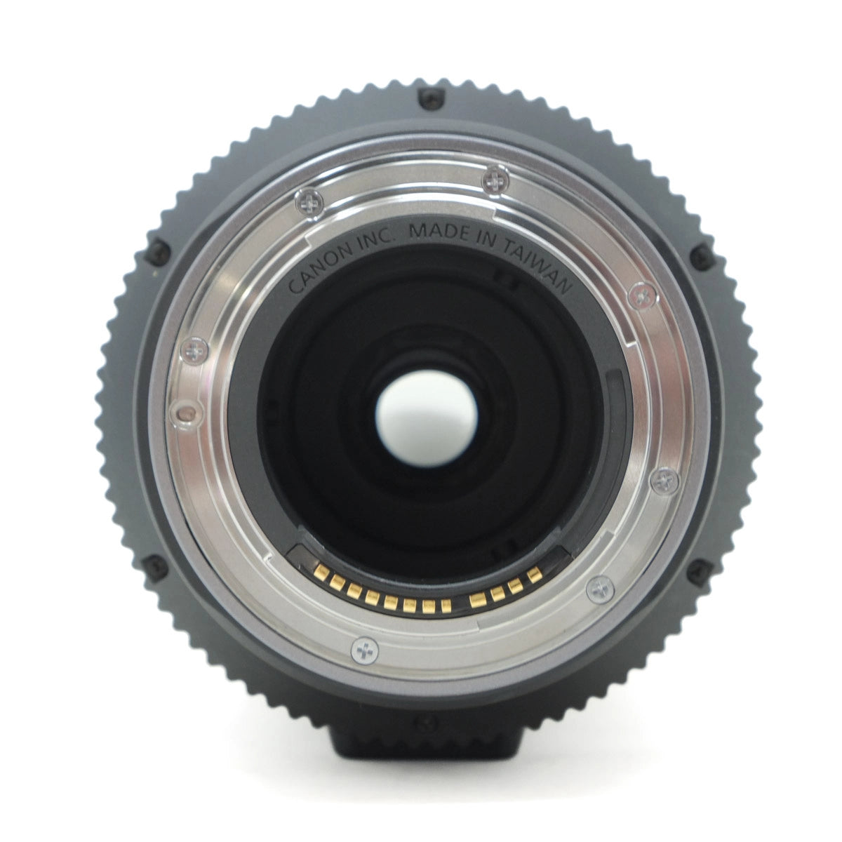 Camera lens with 'Canon Inc. Made in Taiwan' text on a white background