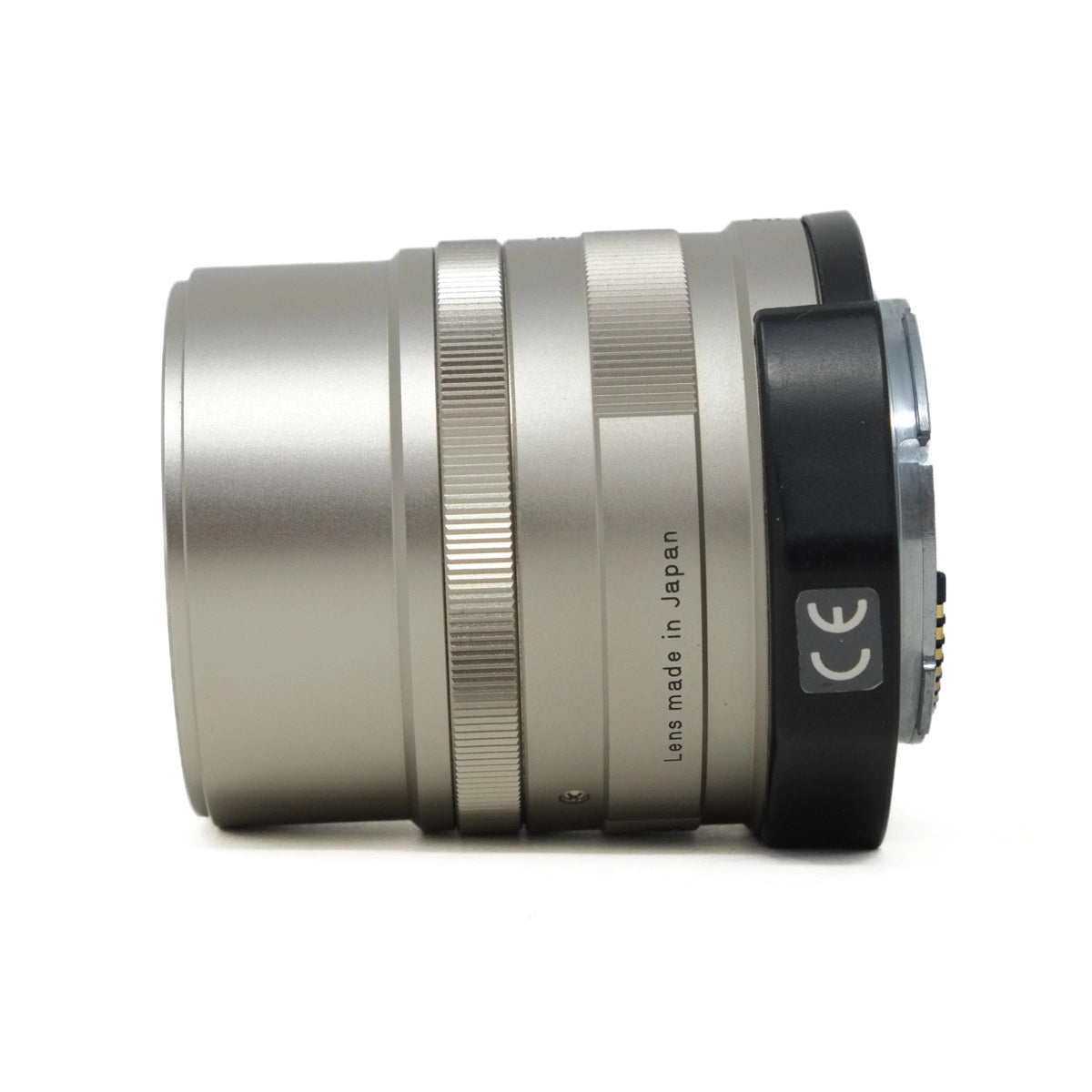Camera lens with 'made in Japan' text on a white background