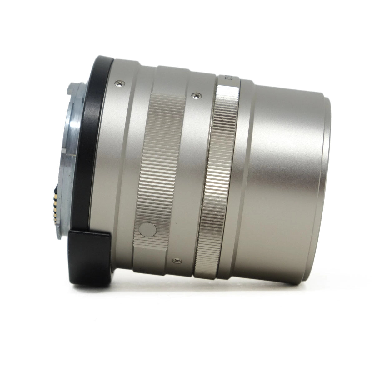 Silver camera lens on a white background