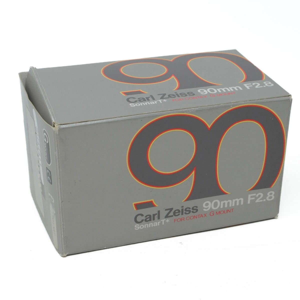 Carl Zeiss 90mm F2.8 lens packaging box on a white background