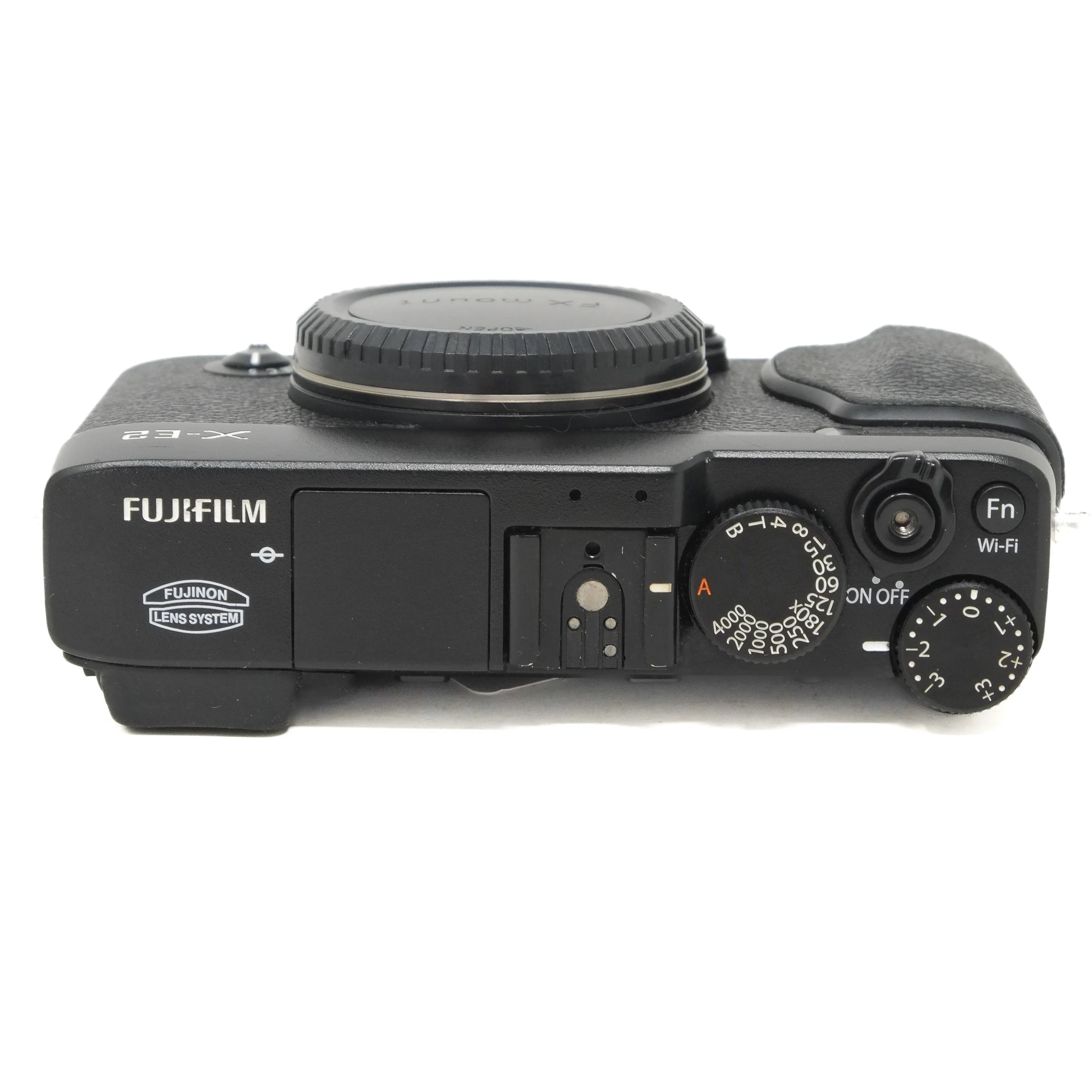 Top view of a Fujifilm camera on a white background