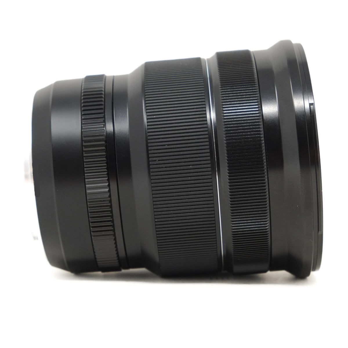 Black camera lens on a white background