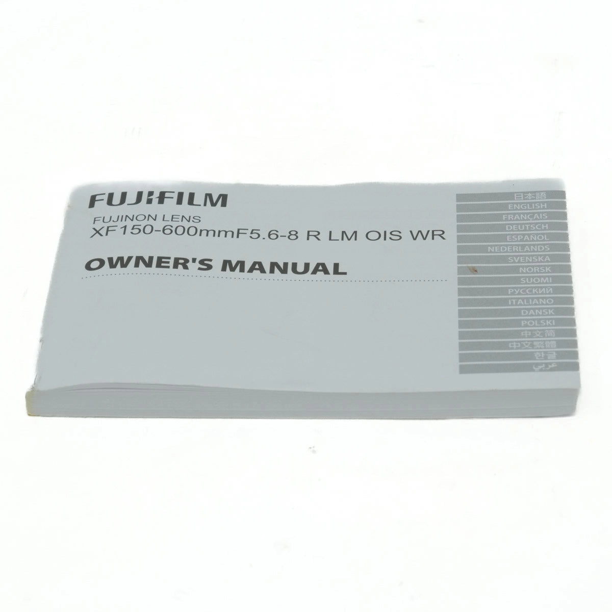 Fujifilm lens owner's manual on a white background