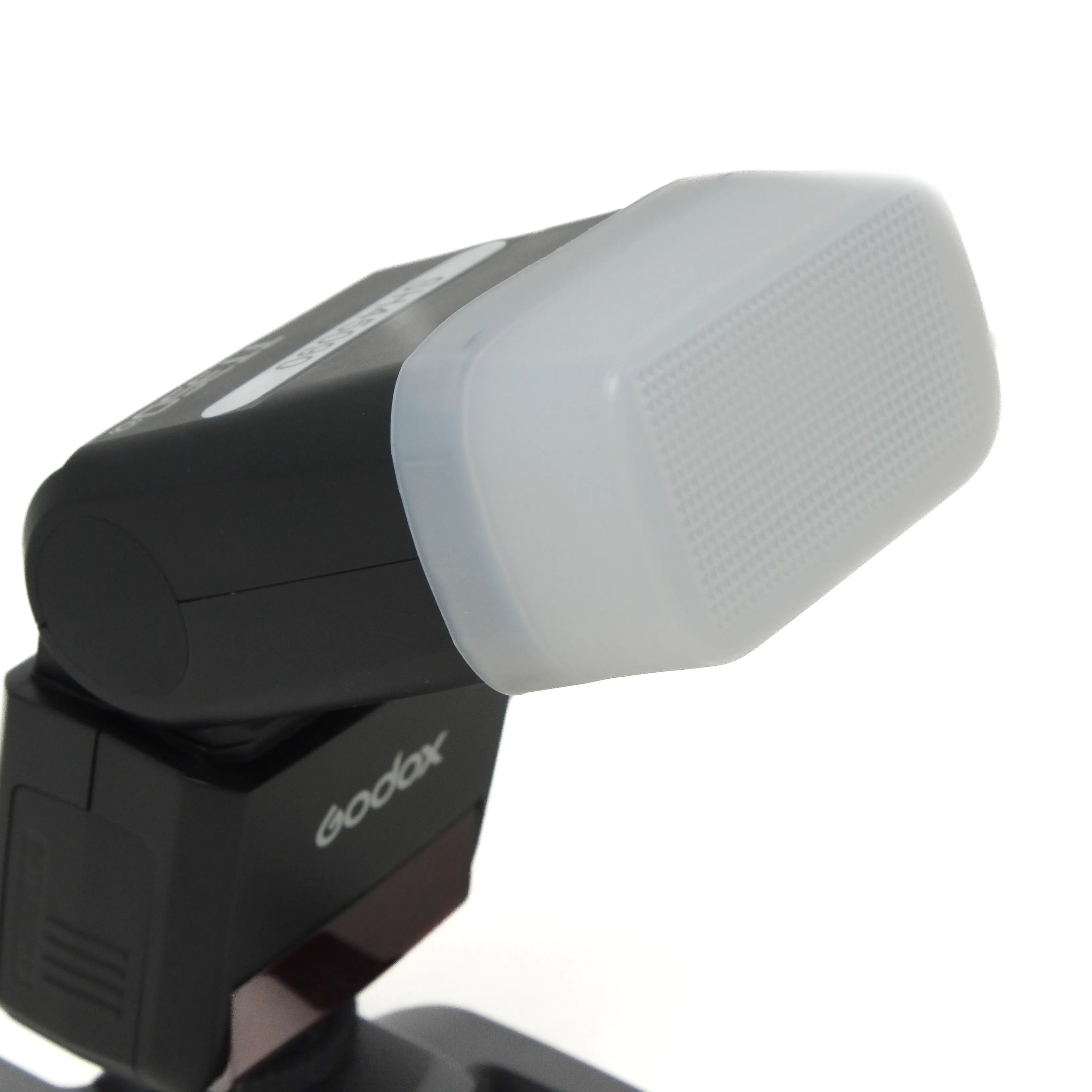 Camera flash with Godox branding on a white background